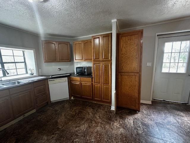 kitchen featuring ornamental molding, sink, a textured ceiling, and white dishwasher