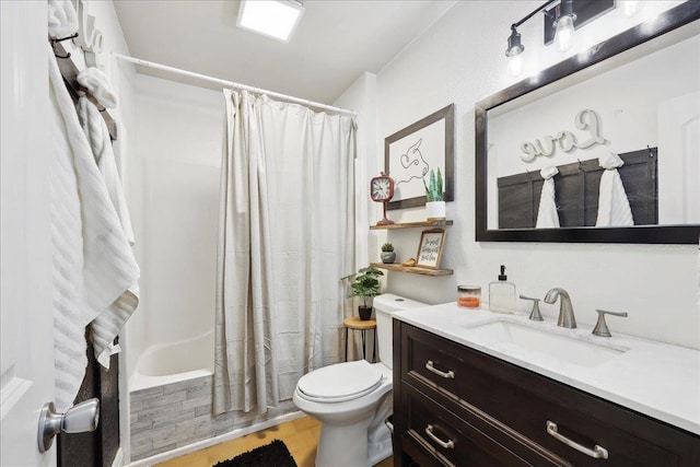 full bathroom with vanity, toilet, and shower / bath combo with shower curtain