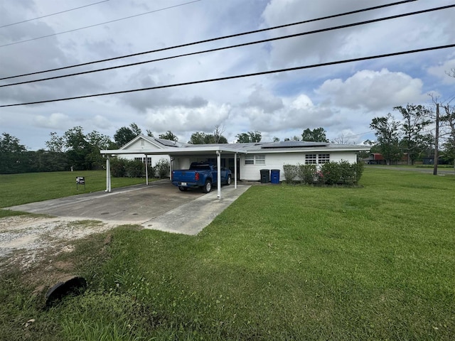view of parking featuring dirt driveway and an attached carport