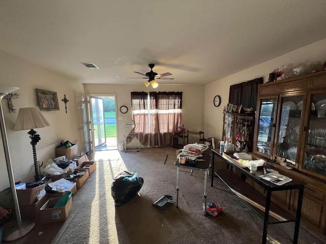 1928 Rev Dr Ranson Howard St, Port Arthur, TX 77640 - living room featuring carpet floors and a ceiling fan