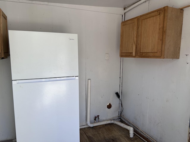 laundry area featuring cabinet space