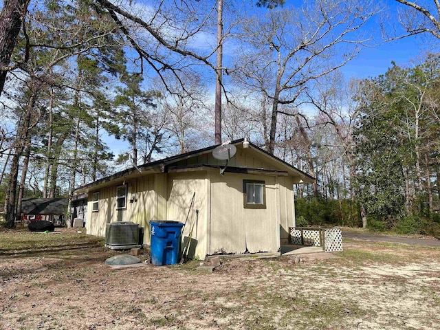 view of home's exterior featuring central air condition unit