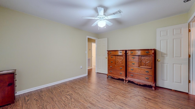 bedroom featuring ceiling fan and light hardwood / wood-style floors