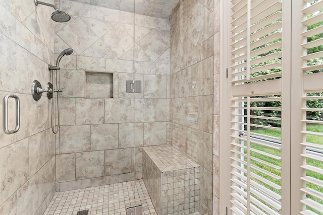 bathroom featuring an enclosed shower