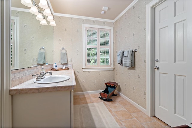 bathroom with tile patterned flooring, vanity, and crown molding