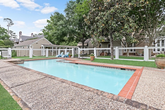 view of pool featuring a patio