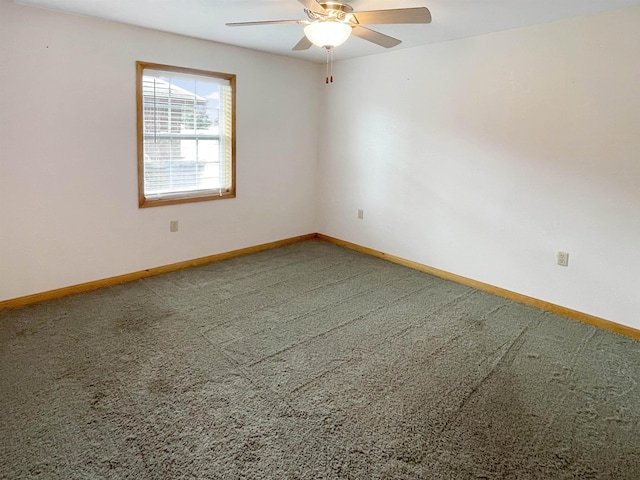 unfurnished room featuring carpet floors and ceiling fan