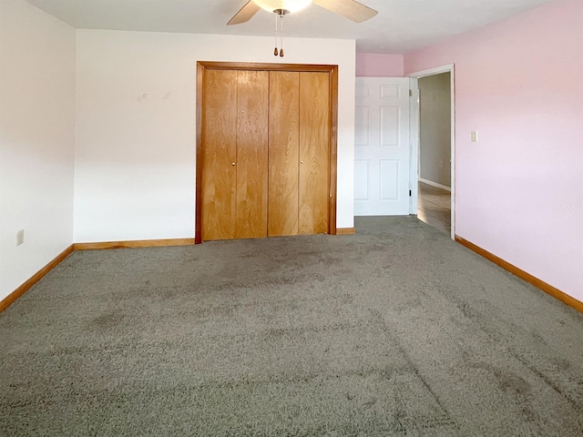 unfurnished bedroom with ceiling fan, carpet floors, and a closet