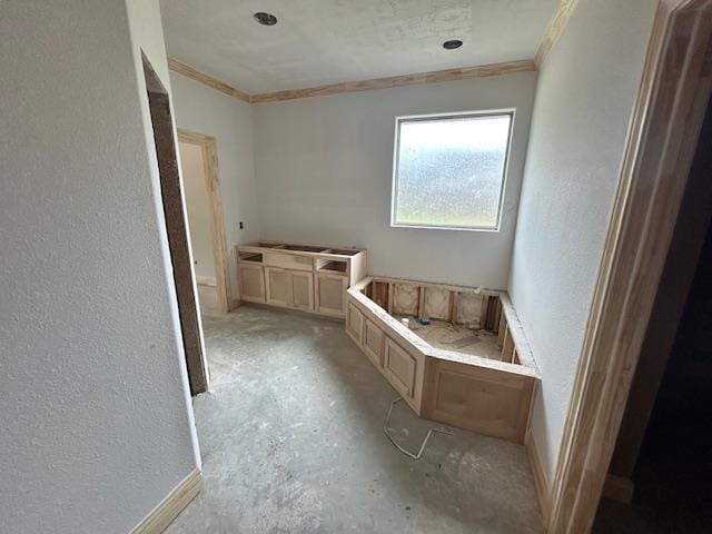 bathroom with crown molding