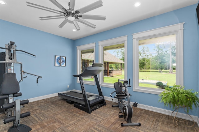 exercise room featuring ceiling fan