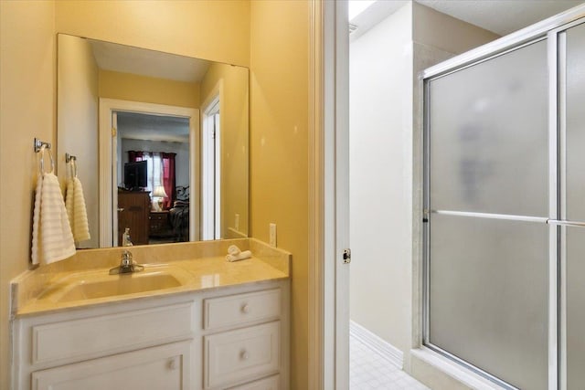 bathroom with vanity and walk in shower