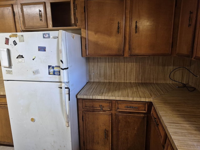 kitchen featuring white fridge