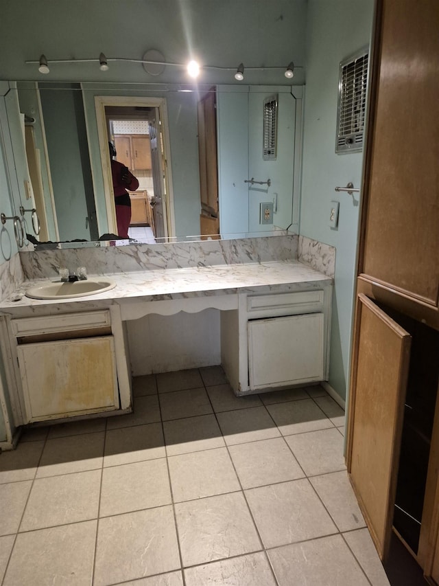 bathroom featuring vanity and tile patterned flooring