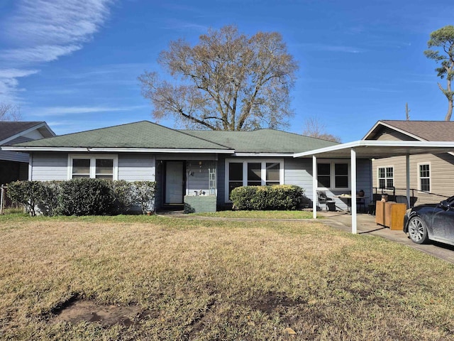 single story home with a front yard