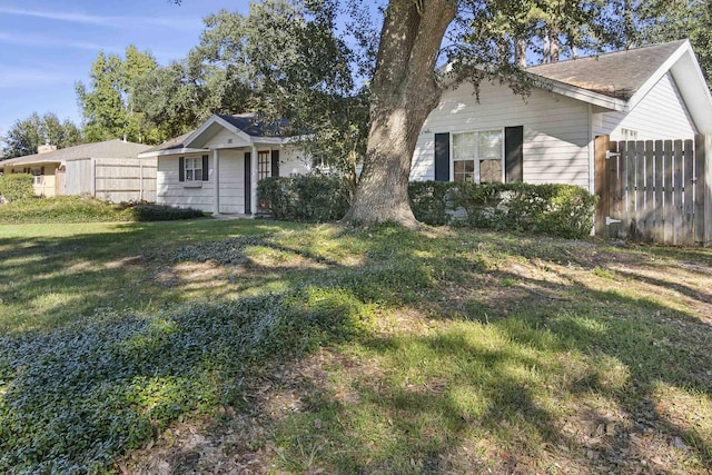 exterior space featuring a front yard