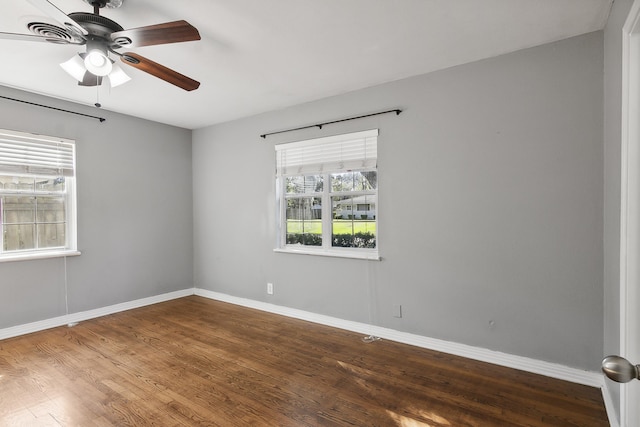 unfurnished room with wood-type flooring and ceiling fan