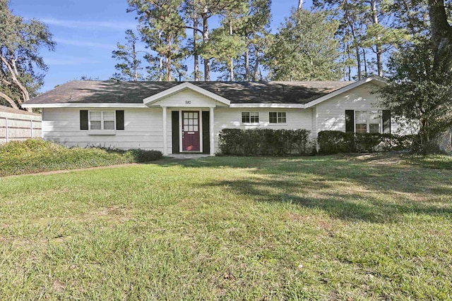 single story home with a front lawn