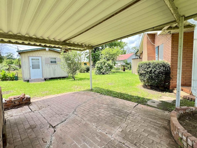 view of patio with a shed