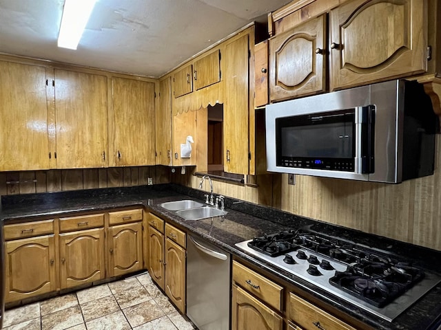 kitchen featuring appliances with stainless steel finishes and sink