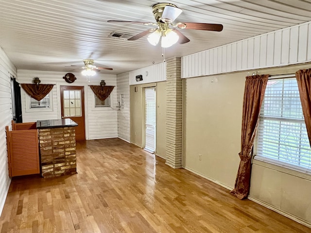 interior space featuring light hardwood / wood-style flooring and ceiling fan