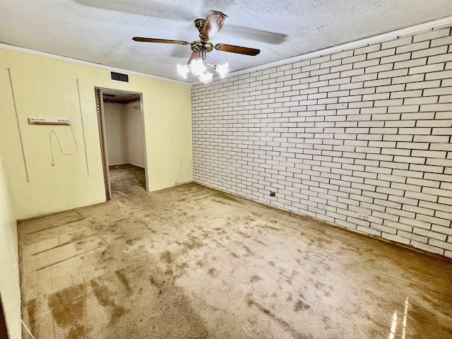 unfurnished bedroom featuring a textured ceiling, light colored carpet, ceiling fan, and brick wall