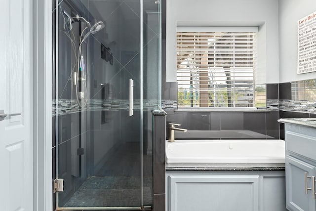 200 Skylark Ave, Bridge City, TX 77611 - full bathroom with a bath, a shower stall, and vanity