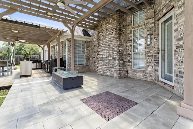 200 Skylark Ave, Bridge City, TX 77611 - view of patio with a ceiling fan, an outdoor fire pit, a pergola, and area for grilling