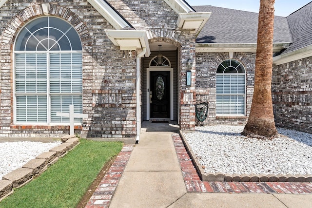 200 Skylark Ave, Bridge City, TX 77611 - entrance to property featuring roof with shingles and brick siding