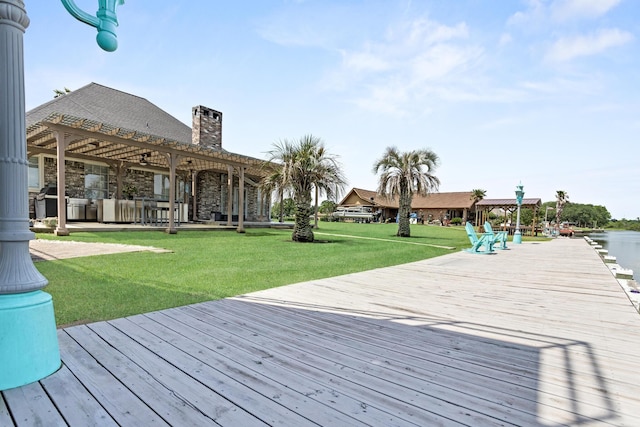 200 Skylark Ave, Bridge City, TX 77611 - wooden deck featuring a pergola and a yard