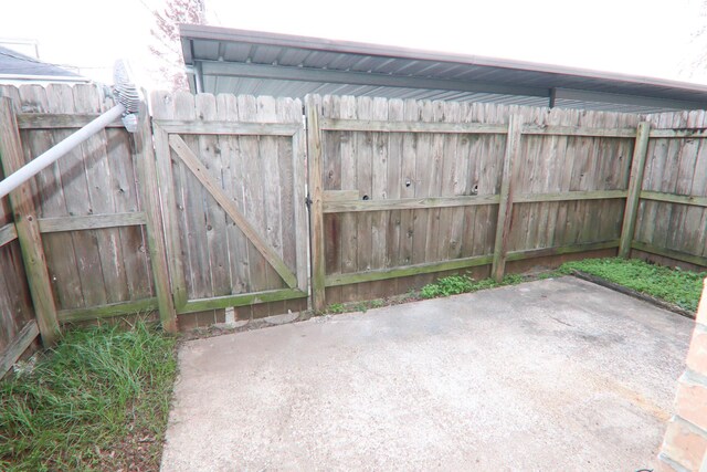 8720 Glen Mdw, Beaumont, TX 77706 - view of patio / terrace with a gate