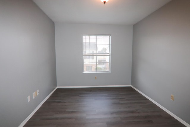 8720 Glen Mdw, Beaumont, TX 77706 - empty room with baseboards and wood finished floors