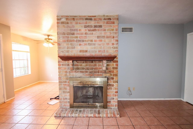 8720 Glen Mdw, Beaumont, TX 77706 - unfurnished living room with tile patterned flooring, a brick fireplace, a ceiling fan, and baseboards