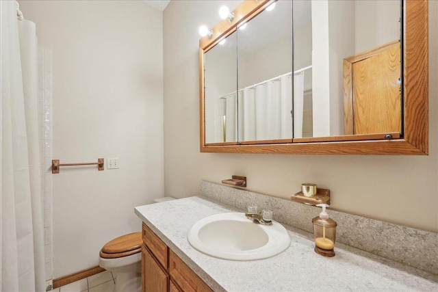 7385 Fannett Rd, Beaumont, TX 77705 - bathroom featuring toilet, vanity, a shower with shower curtain, and tile patterned floors