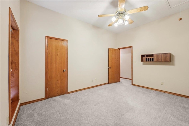 7385 Fannett Rd, Beaumont, TX 77705 - spare room with light colored carpet, baseboards, ceiling fan, and attic access