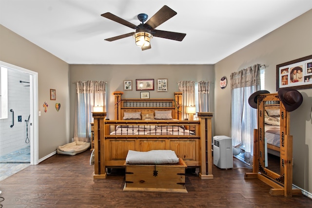 bedroom featuring ceiling fan and dark hardwood / wood-style flooring