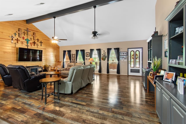 living room featuring high vaulted ceiling, wooden walls, ceiling fan, beamed ceiling, and dark hardwood / wood-style flooring