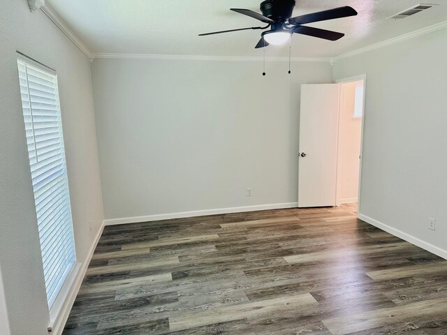9130 Doty St, Beaumont, TX 77707 - unfurnished room featuring ceiling fan, crown molding, wood finished floors, and baseboards