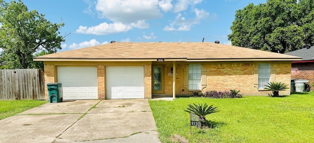 9130 Doty St, Beaumont, TX 77707 - single story home with an attached garage, driveway, and brick siding