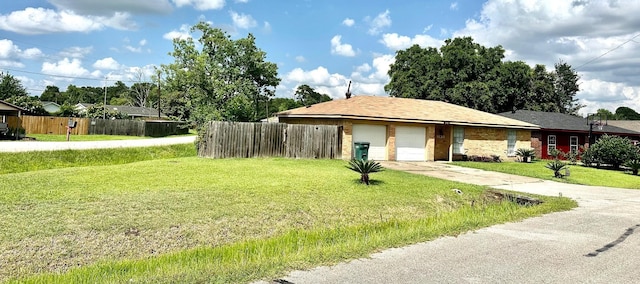 9130 Doty St, Beaumont, TX 77707 - single story home featuring an attached garage and concrete driveway
