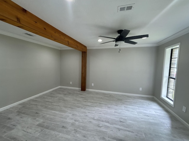 unfurnished room featuring ceiling fan, a healthy amount of sunlight, beam ceiling, and crown molding