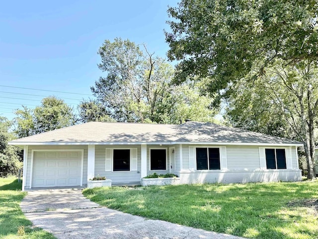 ranch-style house with a front yard and a garage