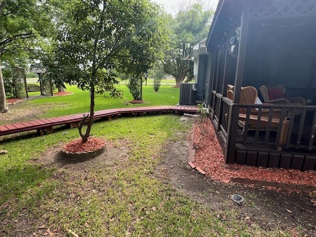 view of yard featuring central AC unit