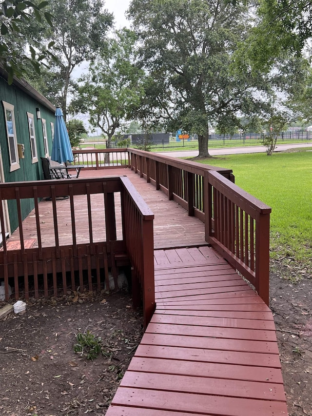 deck featuring a yard