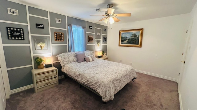 bedroom with dark colored carpet and ceiling fan