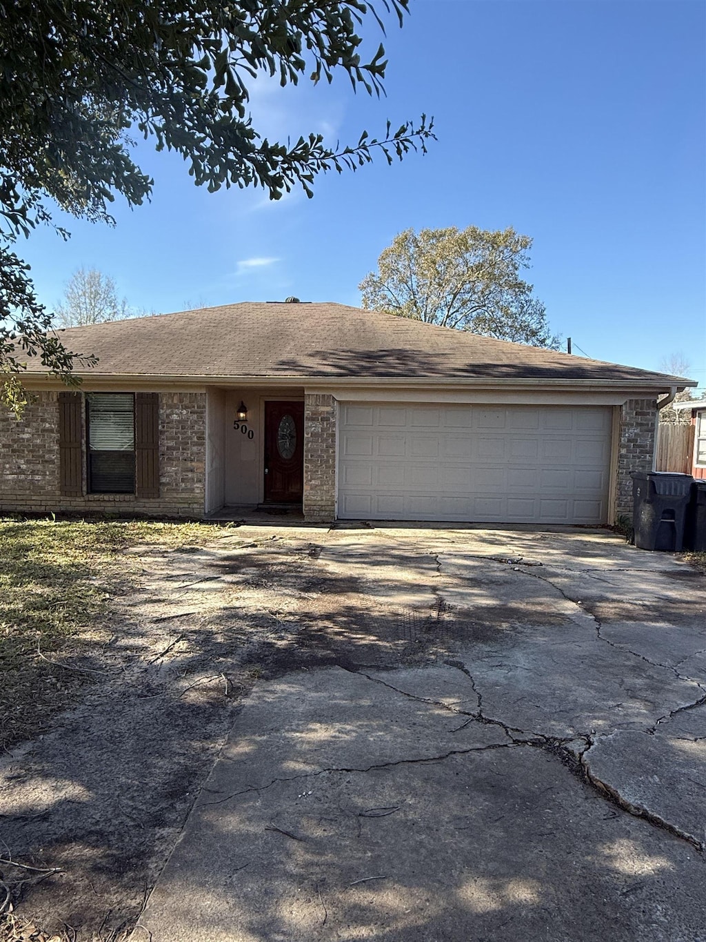 ranch-style home with a garage