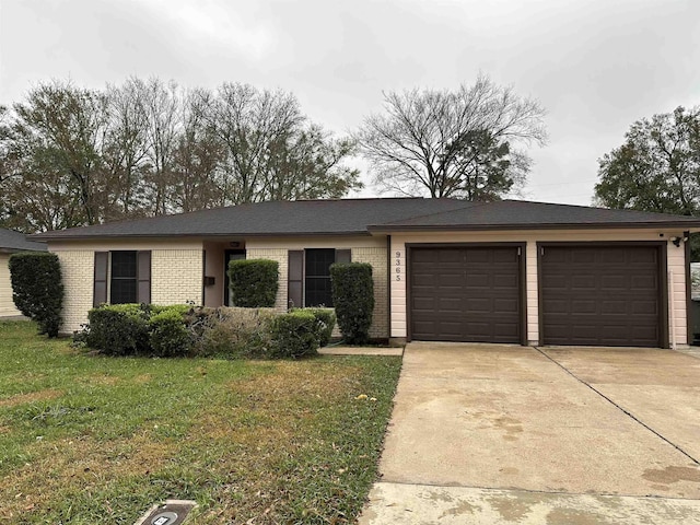 ranch-style home featuring a front yard