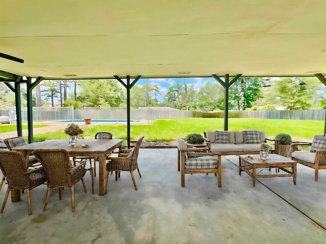 view of patio / terrace with a fenced in pool and an outdoor hangout area