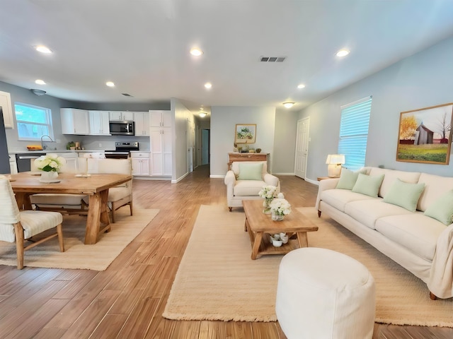 living room featuring light hardwood / wood-style flooring