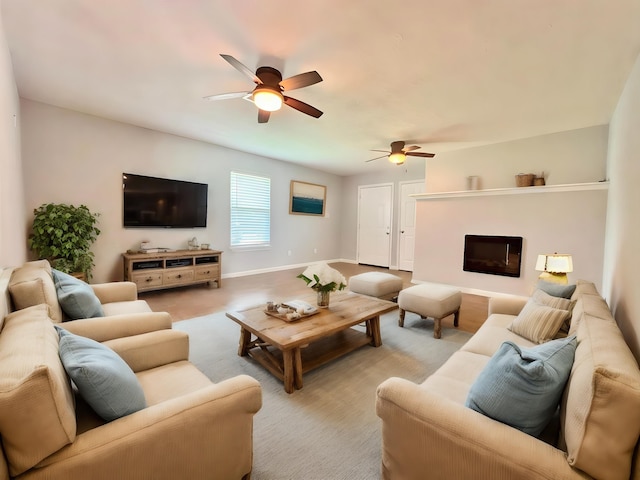 living room with ceiling fan