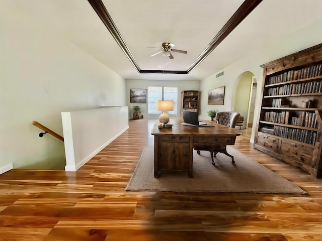 home office with ceiling fan and wood-type flooring